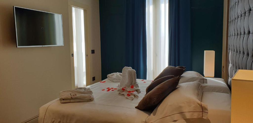 Łóżko lub łóżka w pokoju w obiekcie Best Western Plus Hotel Perla Del Porto