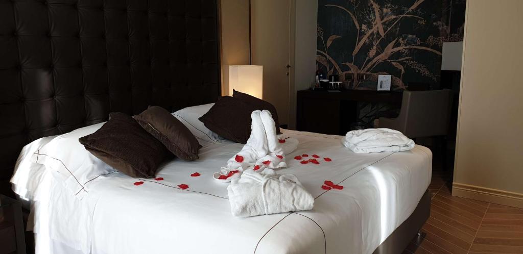 Łóżko lub łóżka w pokoju w obiekcie Best Western Plus Hotel Perla Del Porto