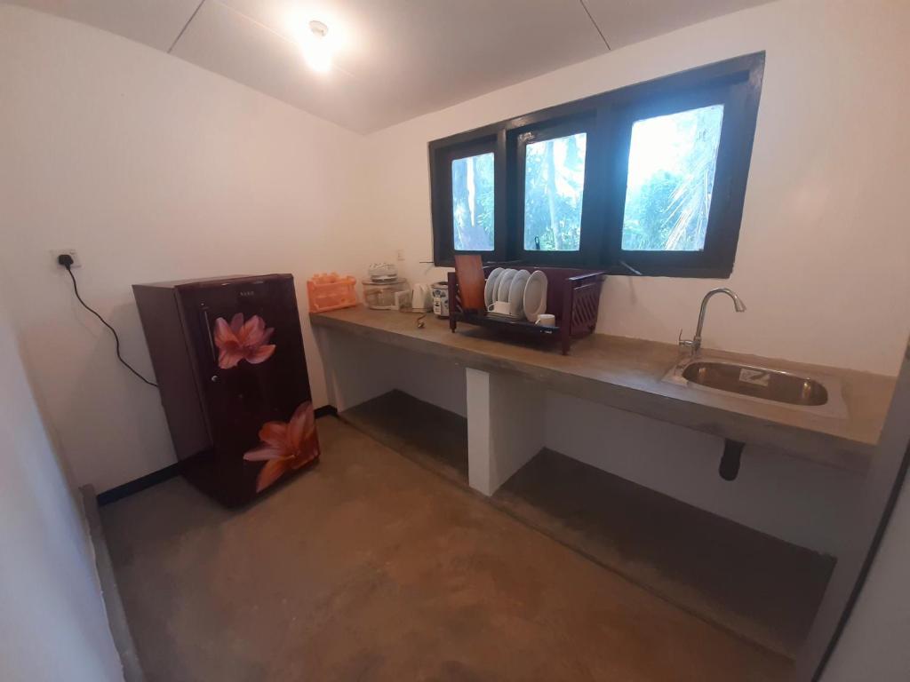 Kuchyň nebo kuchyňský kout v ubytování Abinu"s Place