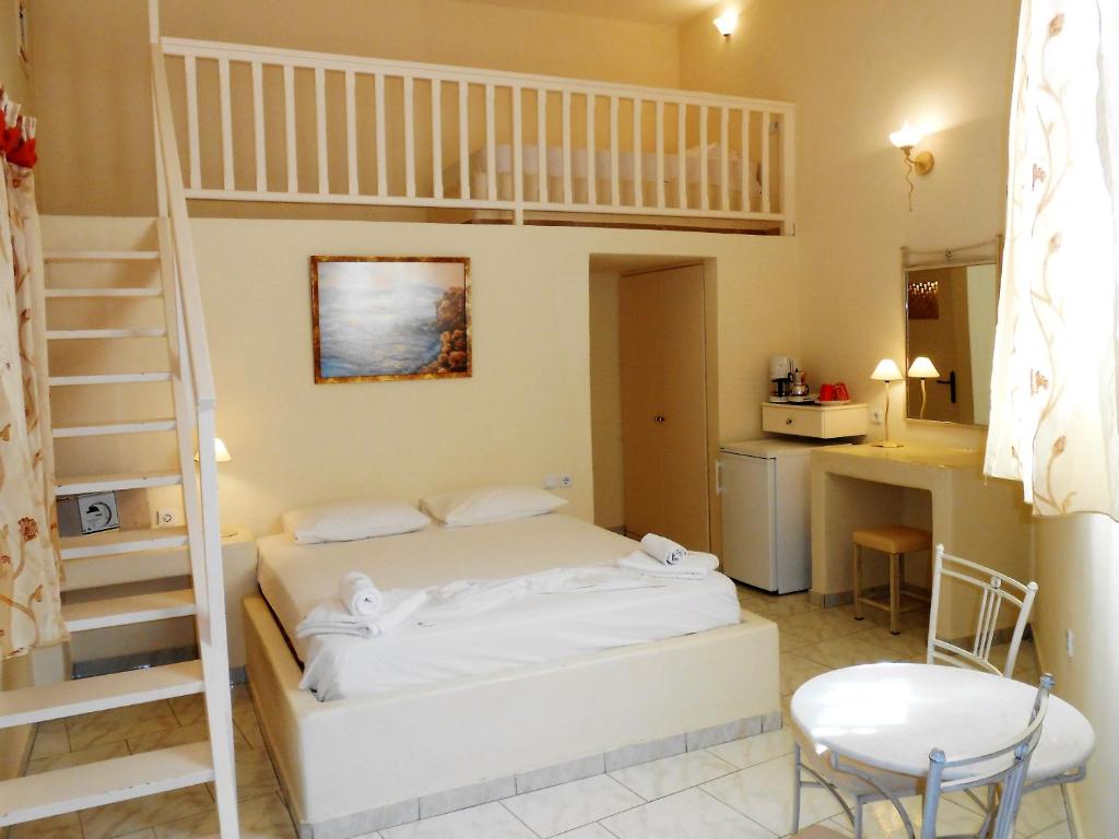 A bed or beds in a room at Livanios Studios