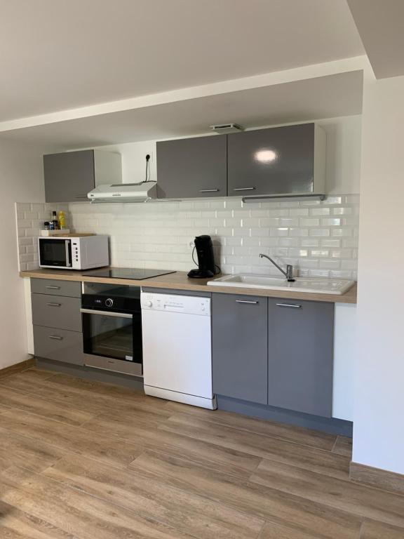 Køkken eller tekøkken på Appartement, centre ville AIGUILLON