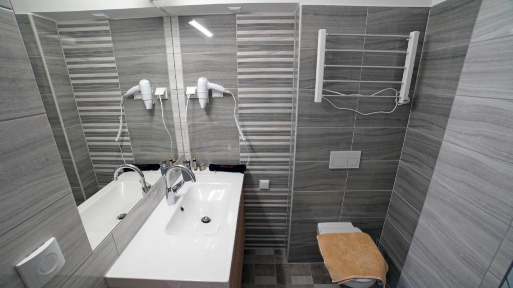 Kúpeľňa v ubytovaní Fenyves Apartmanok