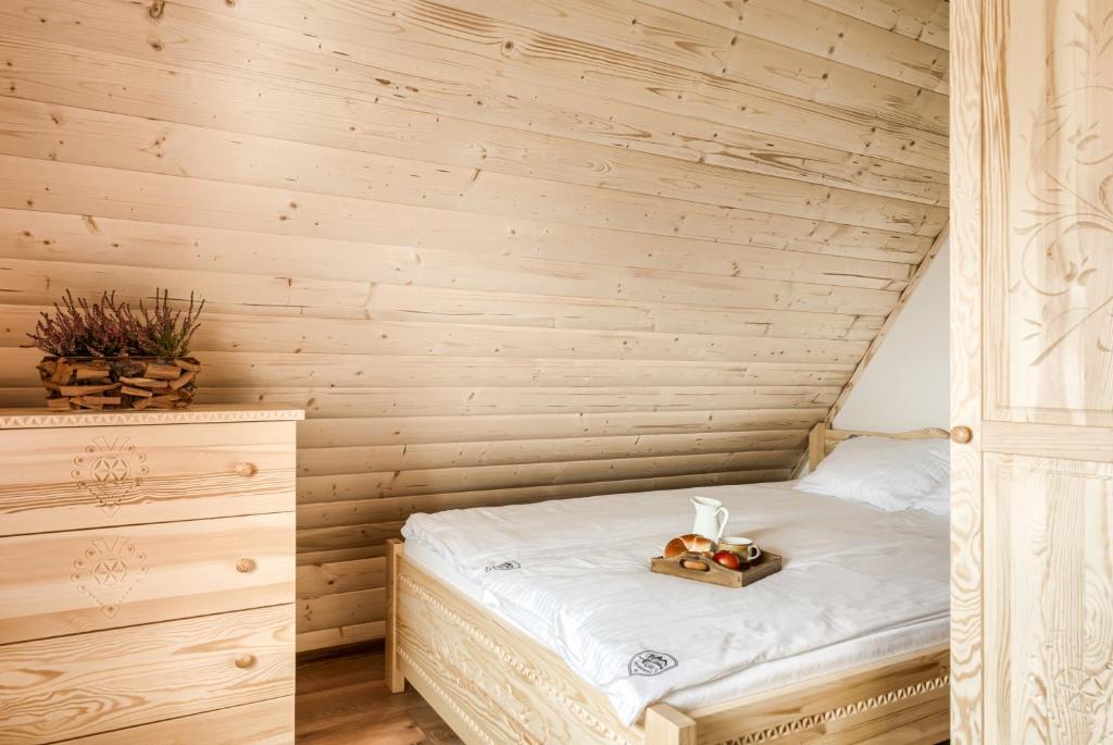 Posteľ alebo postele v izbe v ubytovaní Apartamenty VILLA SKI-BÓWKI