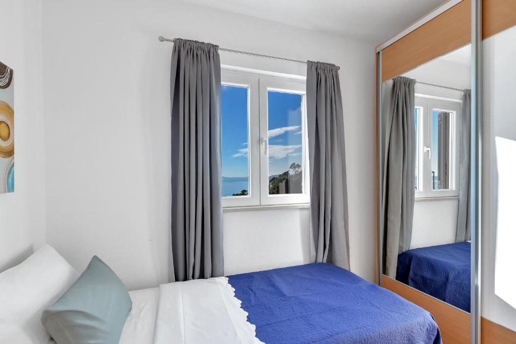Posteľ alebo postele v izbe v ubytovaní Apartments Šantrić - The Hill