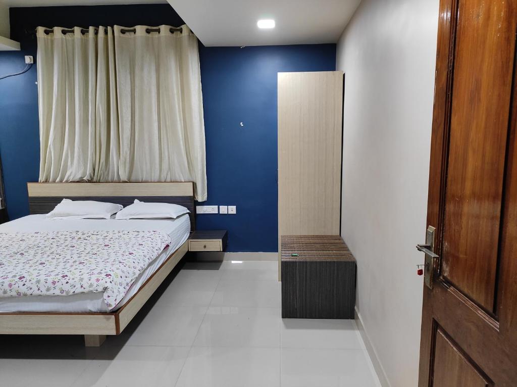 Postel nebo postele na pokoji v ubytování Guesthouse Sakina Colva