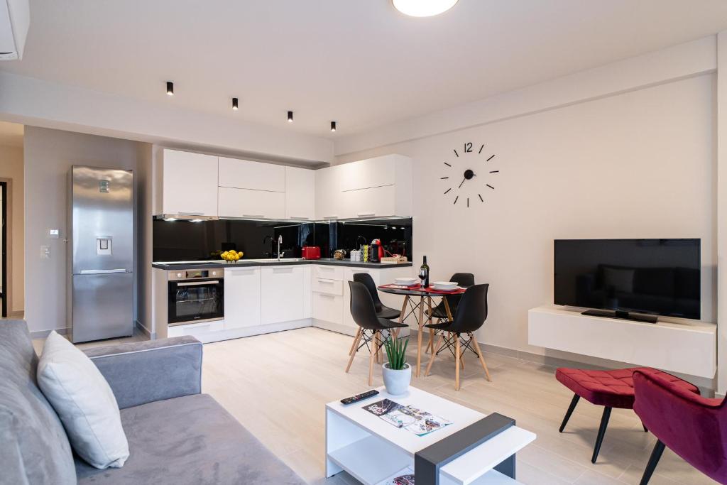 Kuchyň nebo kuchyňský kout v ubytování Petit Palace Trikala