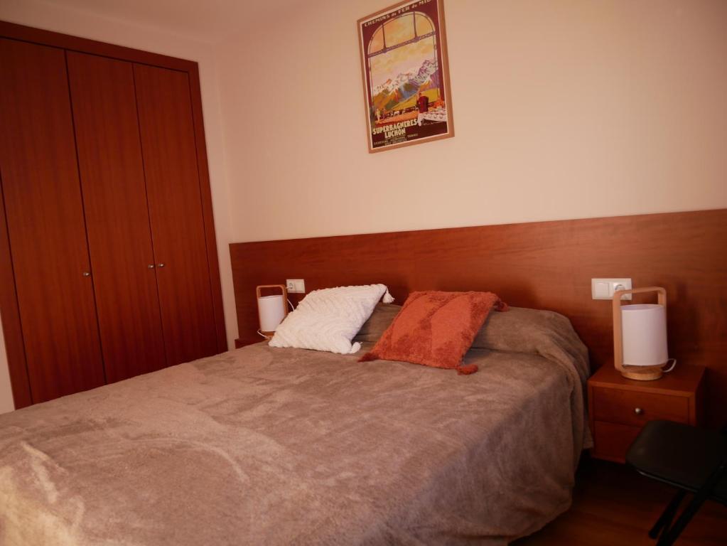 Postel nebo postele na pokoji v ubytování Solana-El Tarter