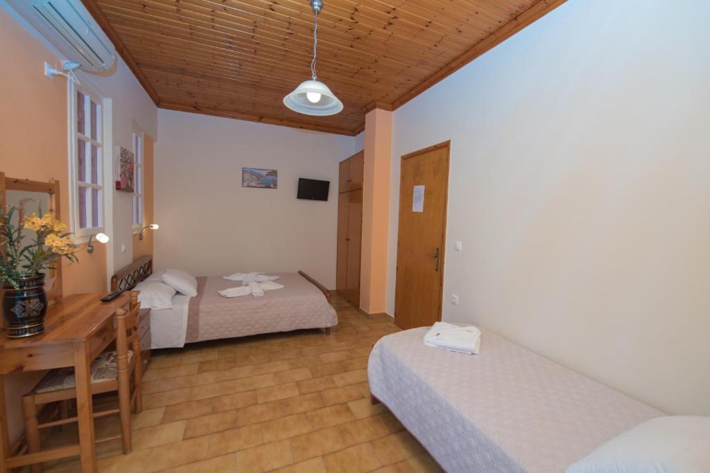 Posteľ alebo postele v izbe v ubytovaní Villa Ferendinoy - Ferendinoy Dionisia