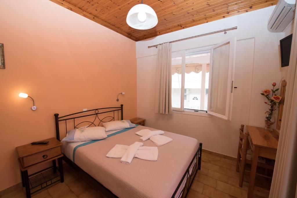 Posteľ alebo postele v izbe v ubytovaní Villa Ferendinoy - Ferendinoy Dionisia