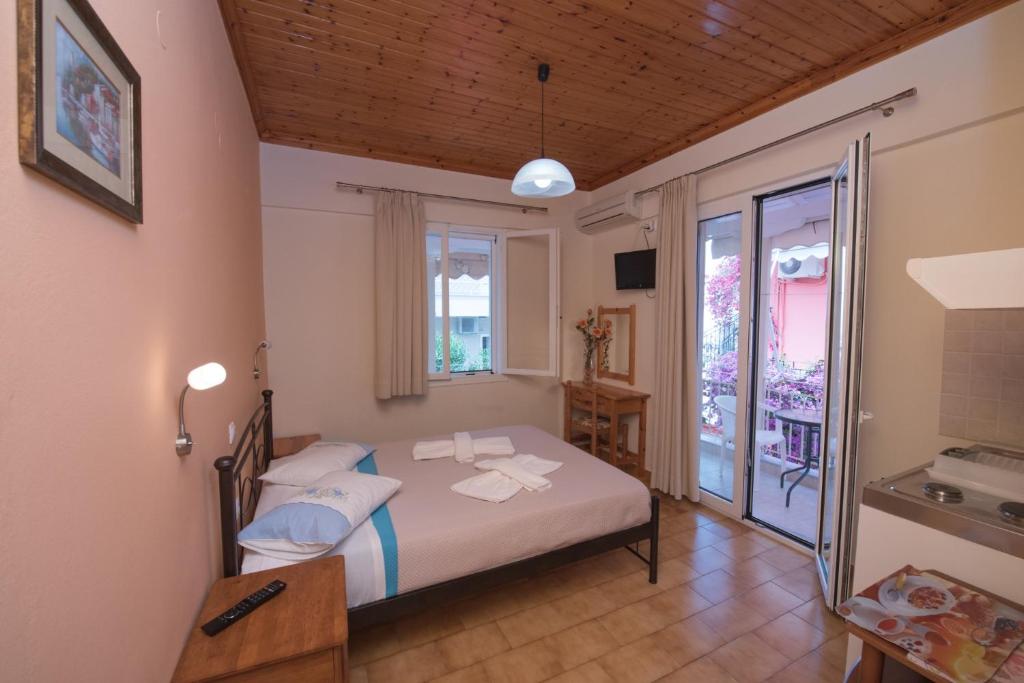 Posteľ alebo postele v izbe v ubytovaní Villa Ferendinoy - Ferendinoy Dionisia
