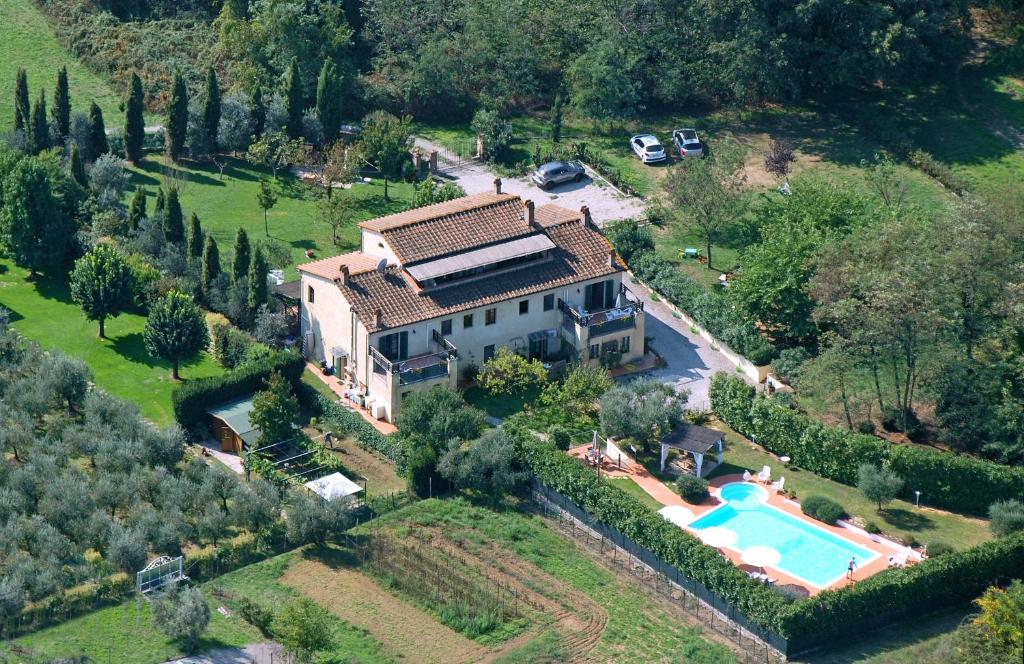 an aerial view of a house with a swimming pool at Casal di Peppe B&B in Orentano