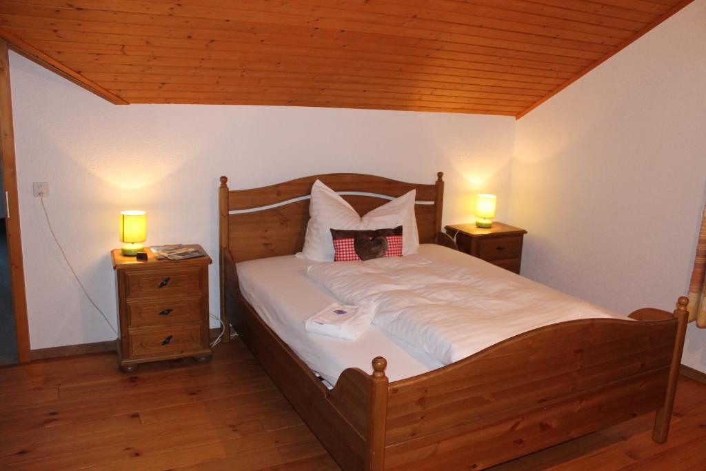 Postel nebo postele na pokoji v ubytování Hotel Rothorn Vintage-Style