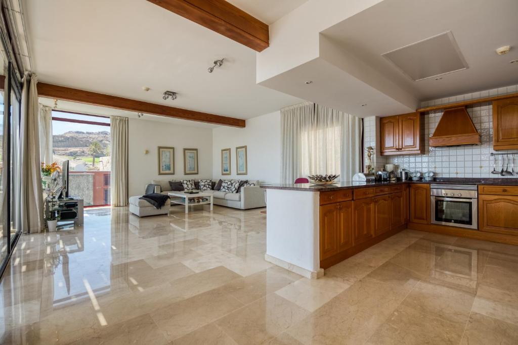 Kuchyň nebo kuchyňský kout v ubytování Sunset Villa