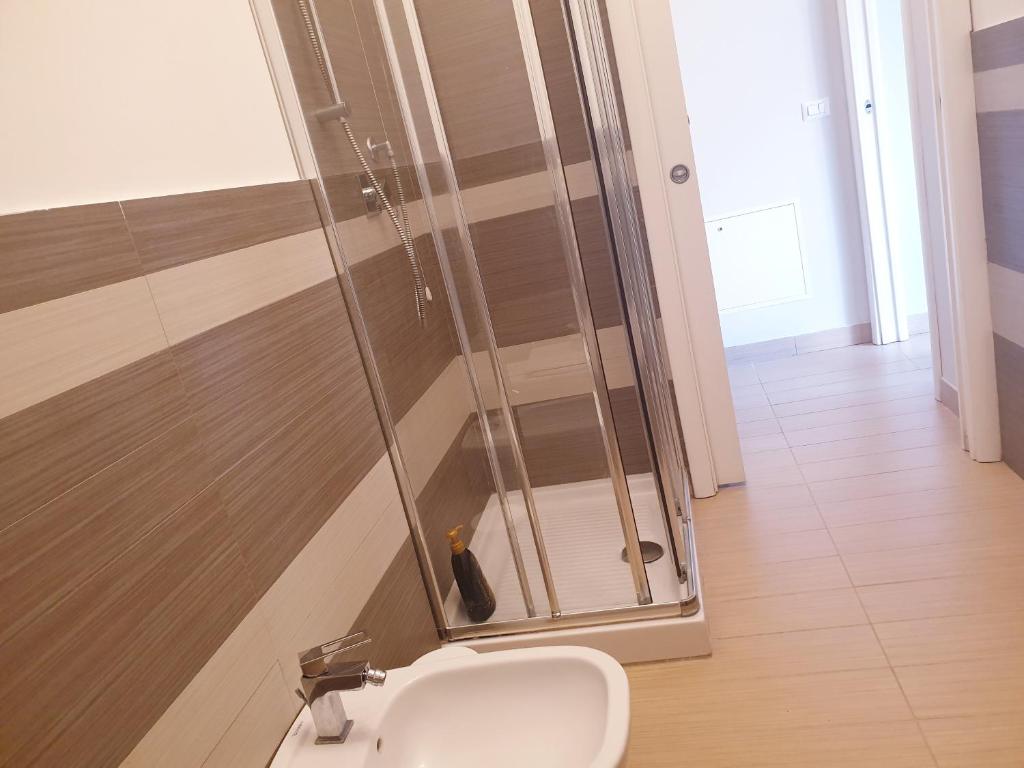 Koupelna v ubytování Michelangelo Apartments con parcheggio gratuito in loco e self check in