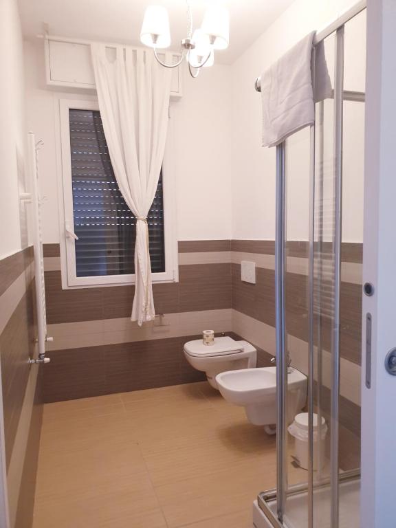 Koupelna v ubytování Michelangelo Apartments con parcheggio gratuito in loco e self check in