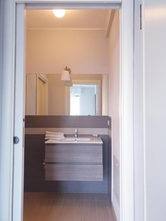Koupelna v ubytování Michelangelo Apartments con parcheggio gratuito in loco e self check in