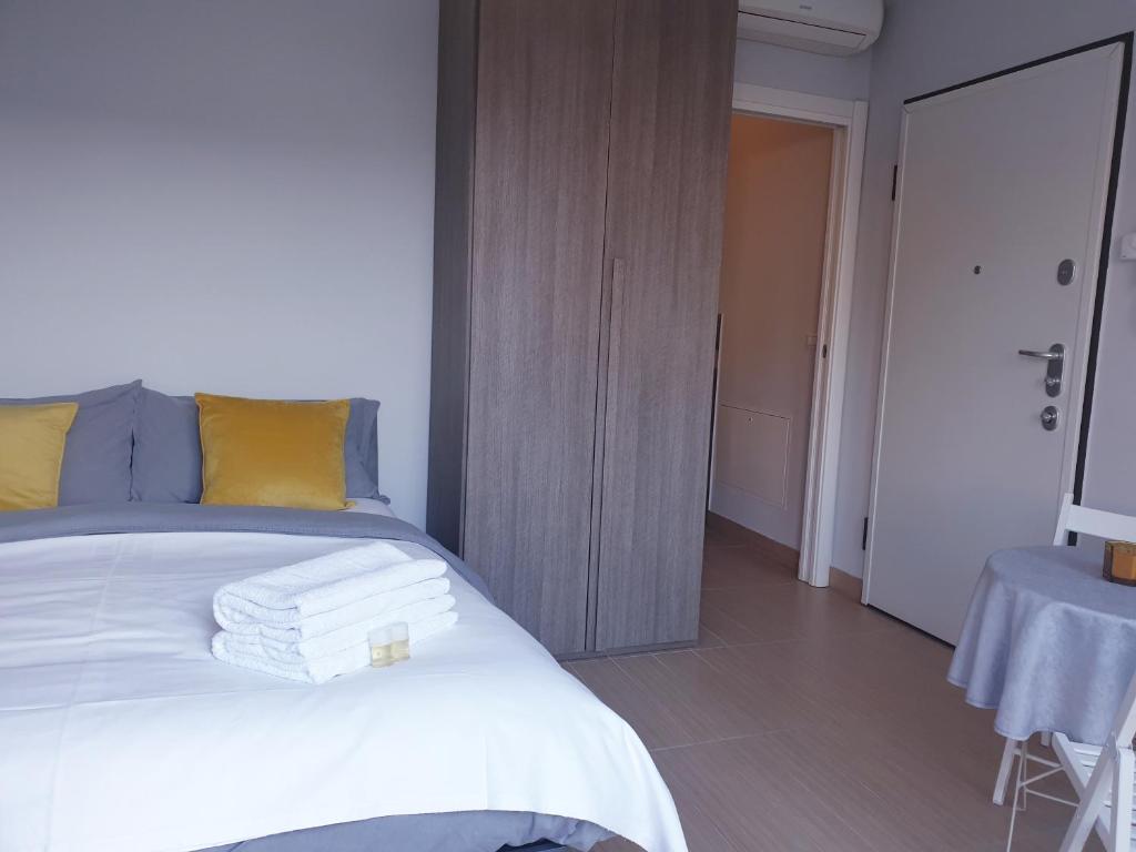 Postel nebo postele na pokoji v ubytování Michelangelo Apartments con parcheggio gratuito in loco e self check in