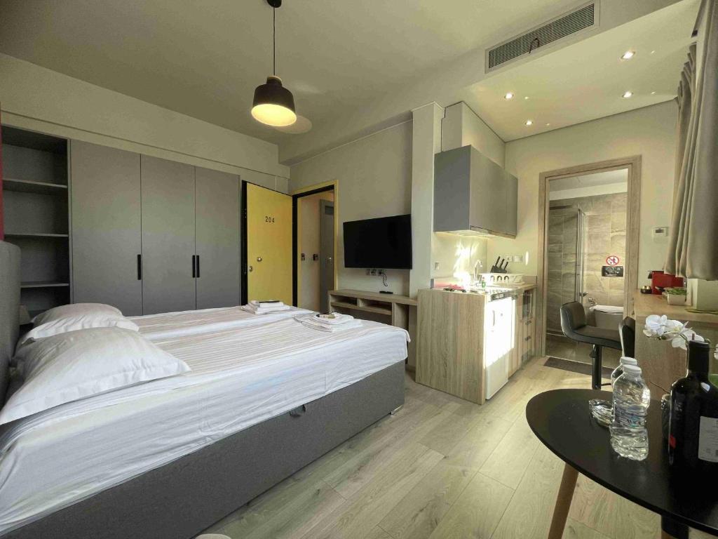 Posteľ alebo postele v izbe v ubytovaní WUKELA APARTMENTS