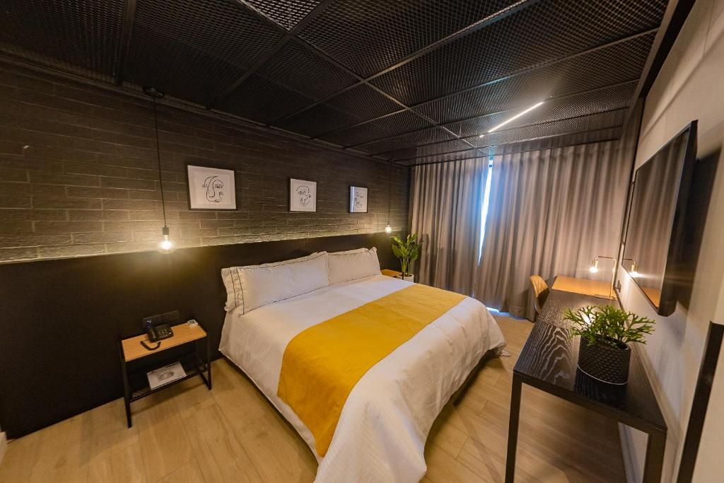 Postel nebo postele na pokoji v ubytování FULTON Business Luxury HOTEL