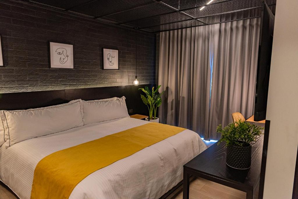 Postel nebo postele na pokoji v ubytování FULTON Business Luxury HOTEL