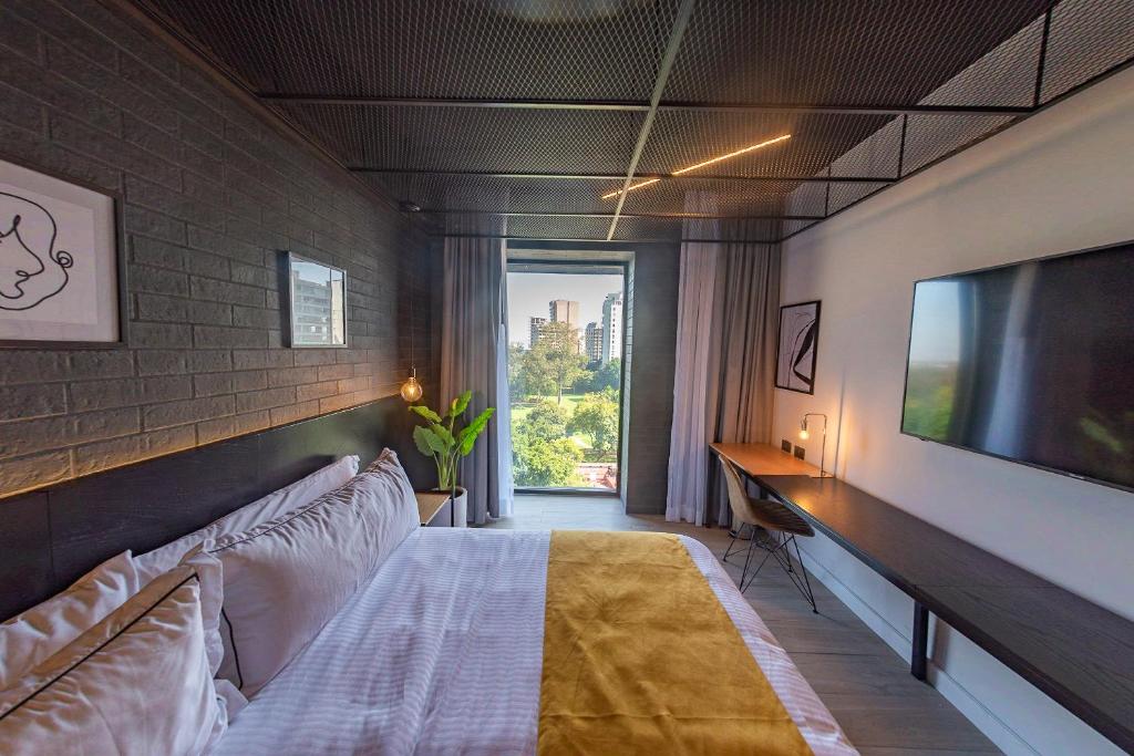 Postel nebo postele na pokoji v ubytování FULTON Business Luxury HOTEL