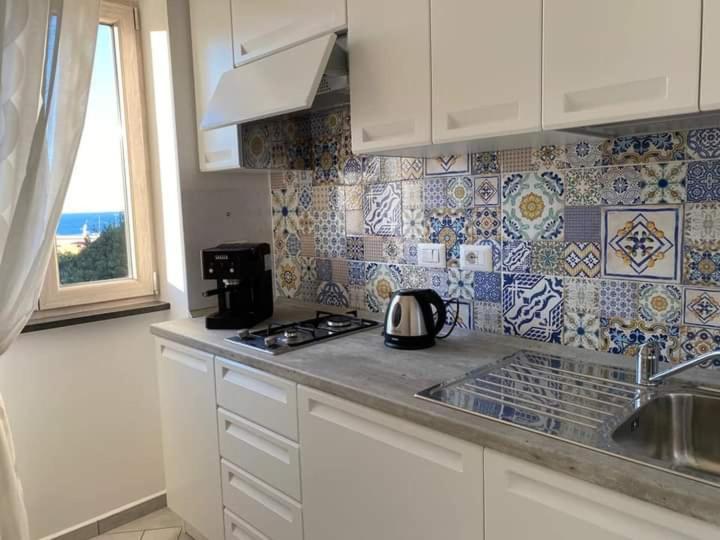 Kuchyň nebo kuchyňský kout v ubytování B&B La Lingua
