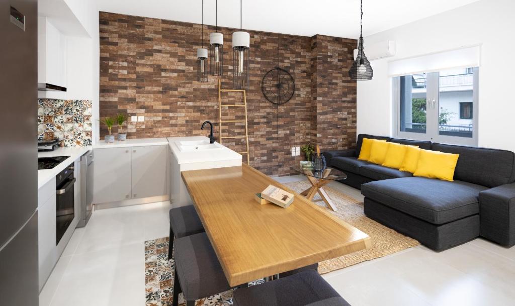 A kitchen or kitchenette at Andos Cozy & Luxury Upgraded Apartments