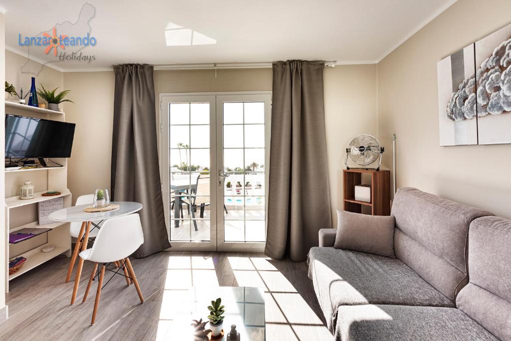 TV a/nebo společenská místnost v ubytování Vivienda Vacacional BelleVue