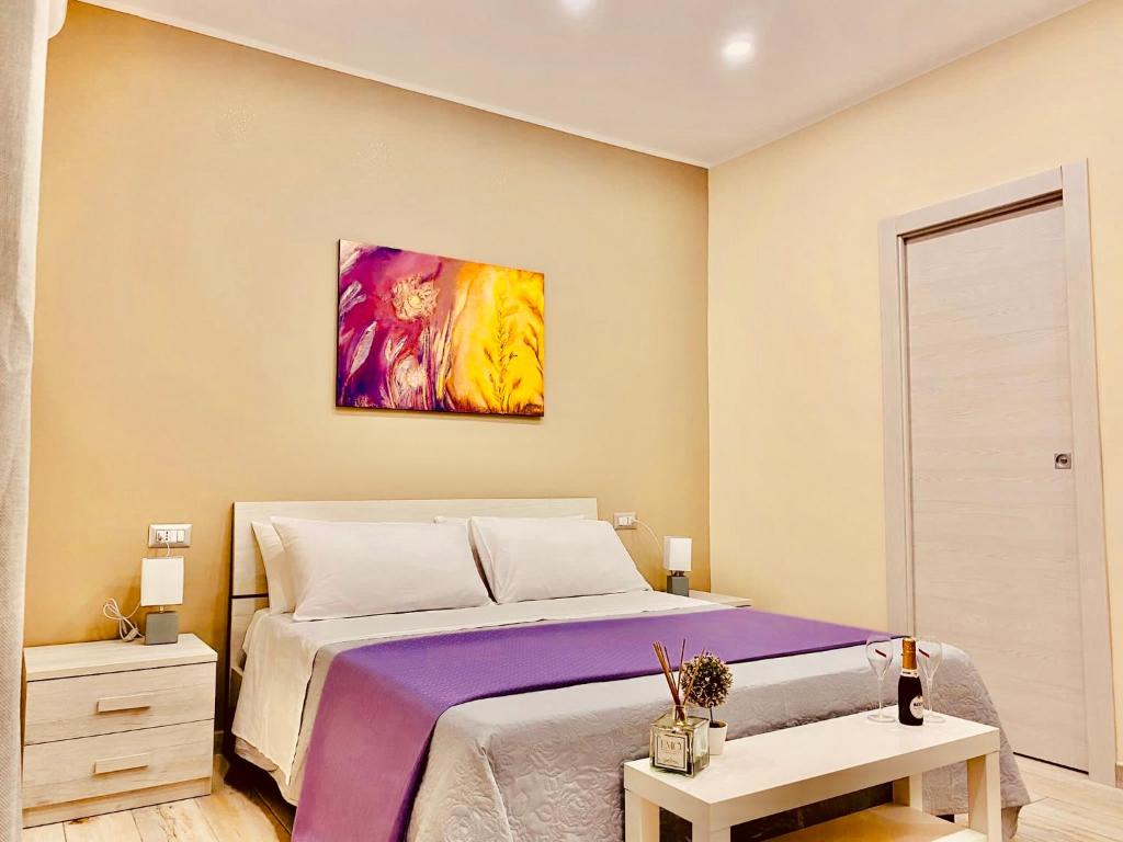 Postel nebo postele na pokoji v ubytování YourHome - La Meta Perfetta Rooms&Spa