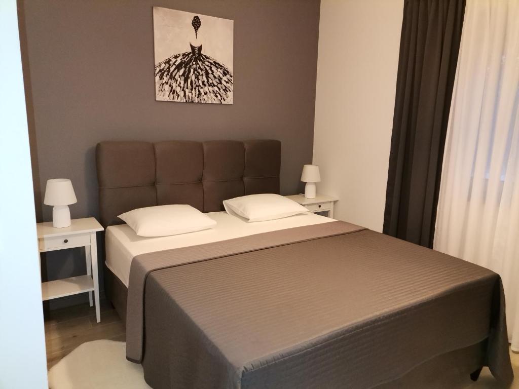 Posteľ alebo postele v izbe v ubytovaní Apartments Star - free private parking