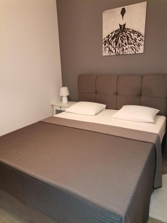 Posteľ alebo postele v izbe v ubytovaní Apartments Star - free private parking