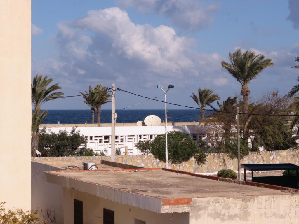 a view of the ocean from the roof of a building at Beautiful appartment with a glorious sea view in Monastir