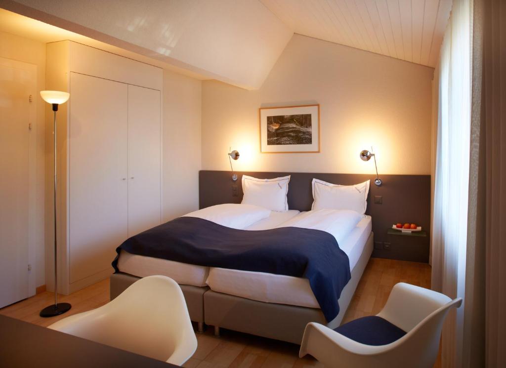 Postel nebo postele na pokoji v ubytování Hotel Wassberg