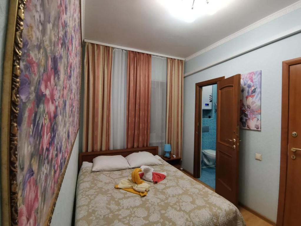Cama o camas de una habitación en Bon-Appart on Bolshaya Morskaya 31 - Irena Guest House