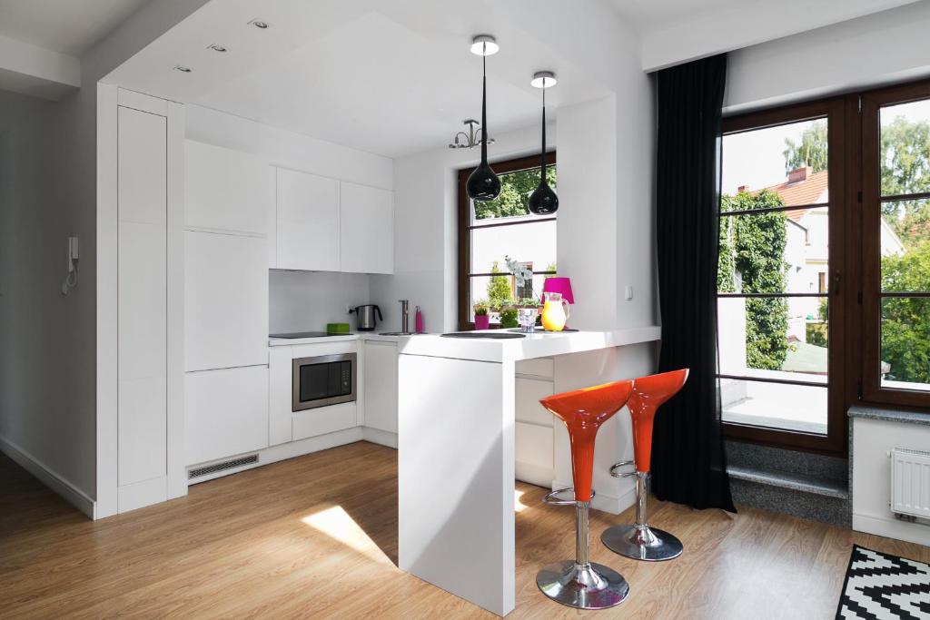 Kuchyň nebo kuchyňský kout v ubytování Costa Apartments