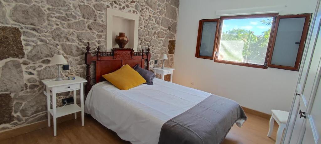 Postel nebo postele na pokoji v ubytování Villa Canaria piscina jacuzzi jardín