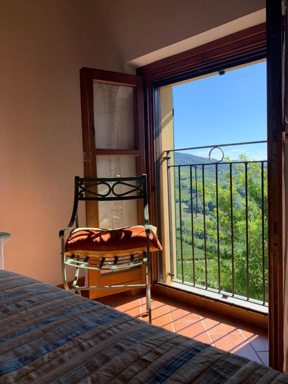 Posteľ alebo postele v izbe v ubytovaní Agriturismo i Gessi