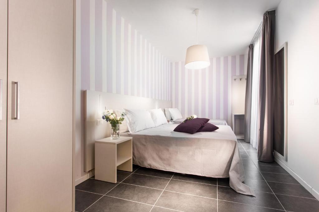 Postel nebo postele na pokoji v ubytování Hotel Star