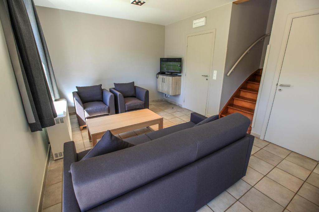 Posezení v ubytování Maisons de Vacances Azur en Ardenne