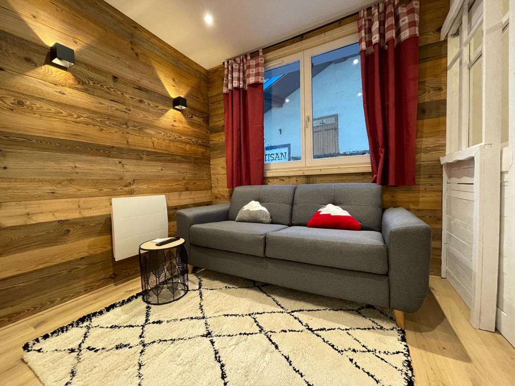 Khu vực ghế ngồi tại Charmant 2 pièces cosy au cœur de Saint-Gervais