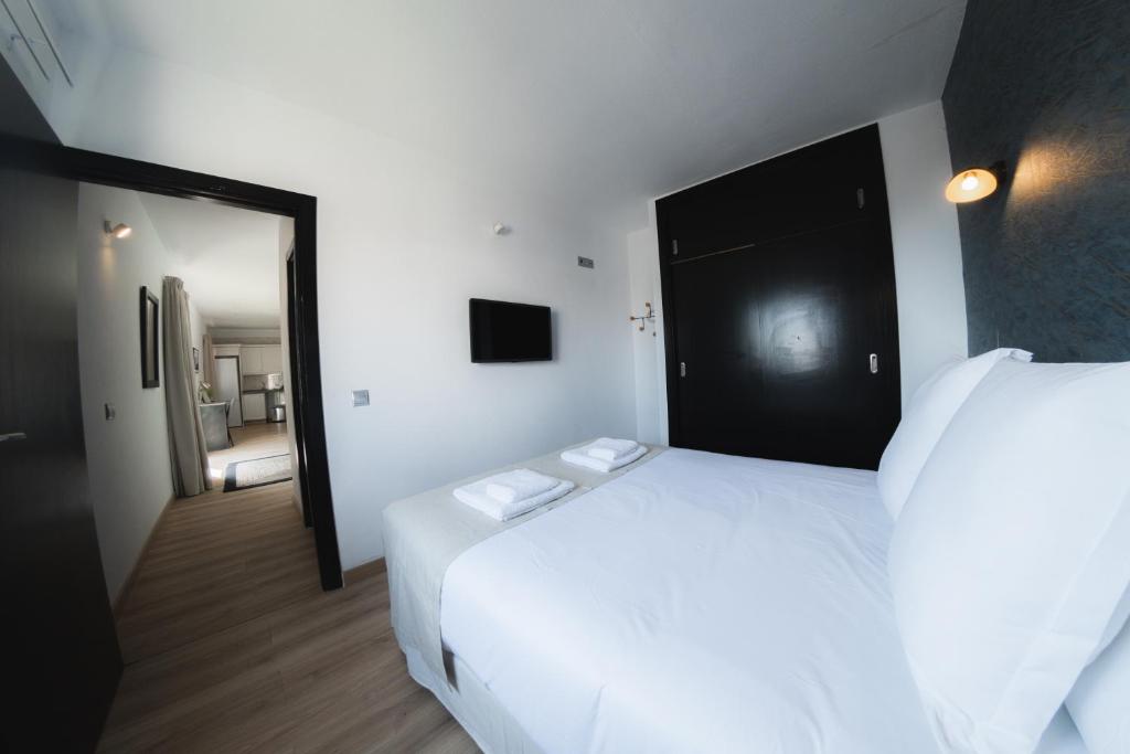 Posteľ alebo postele v izbe v ubytovaní Hotel Ventus