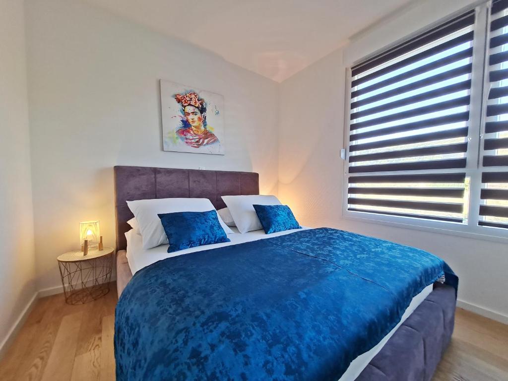 Posteľ alebo postele v izbe v ubytovaní Apartment StellaMare