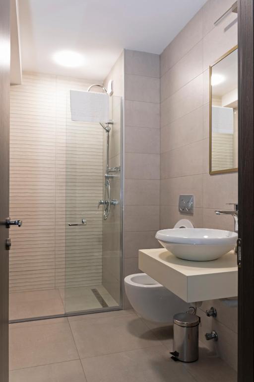 Koupelna v ubytování Paliani Hotel