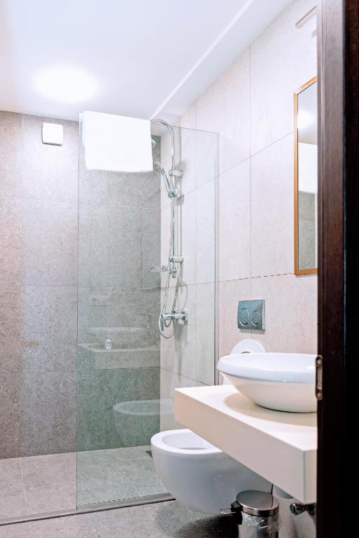 Koupelna v ubytování Paliani Hotel