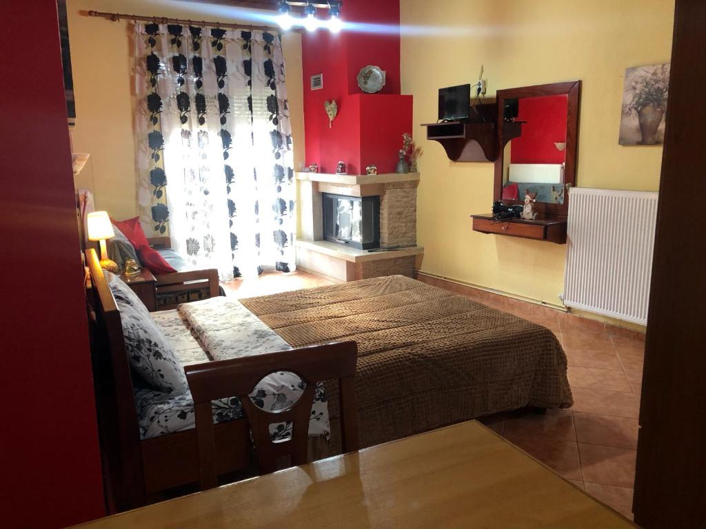 TV a/nebo společenská místnost v ubytování Alexandros Guesthouse