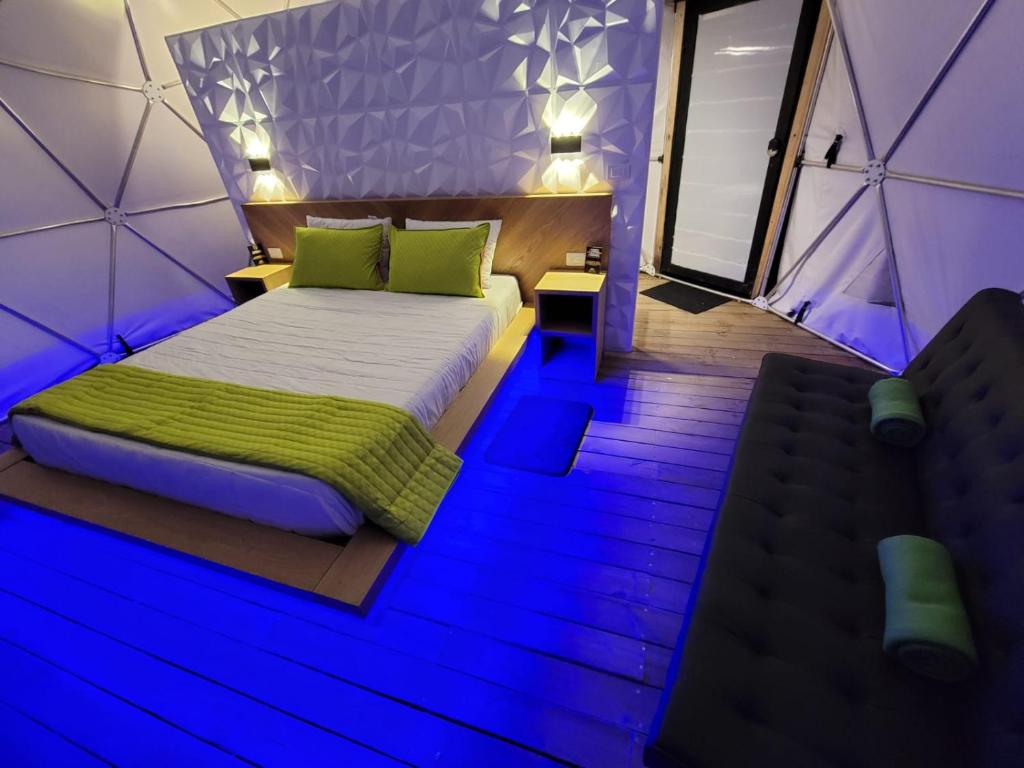 Postel nebo postele na pokoji v ubytování Solaris Glamping Exclusive