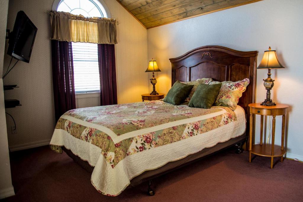 Ліжко або ліжка в номері Grist Mill Inn