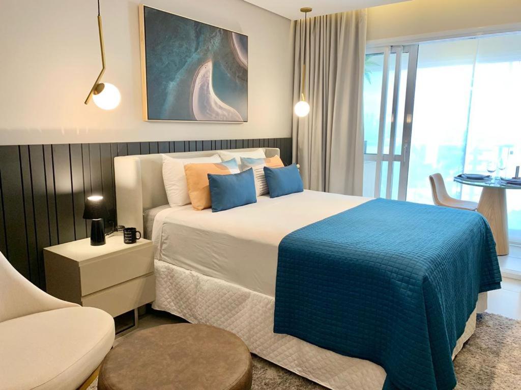 Cama o camas de una habitación en Apartamento luxo com varanda gourmet Síntese 908