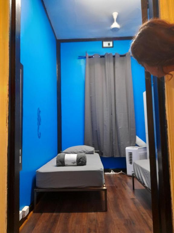 Postel nebo postele na pokoji v ubytování Ozi Inn Backpackers - Perth -Valid Passport Required