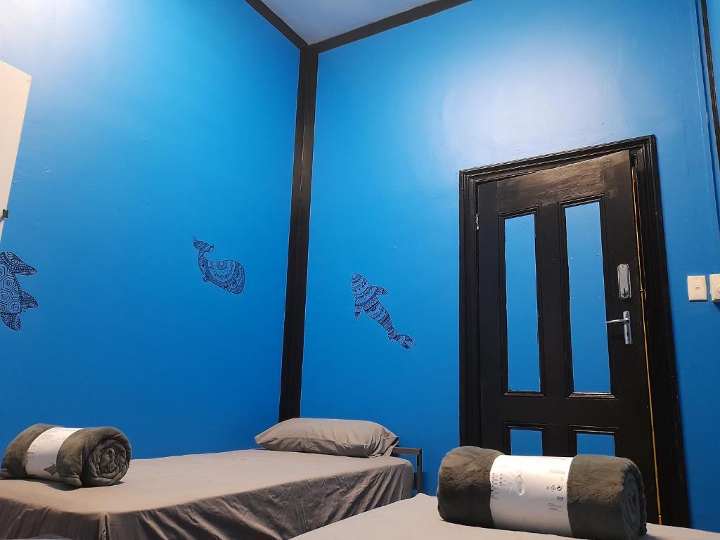 Postel nebo postele na pokoji v ubytování Ozi Inn Backpackers - Perth -Valid Passport Required